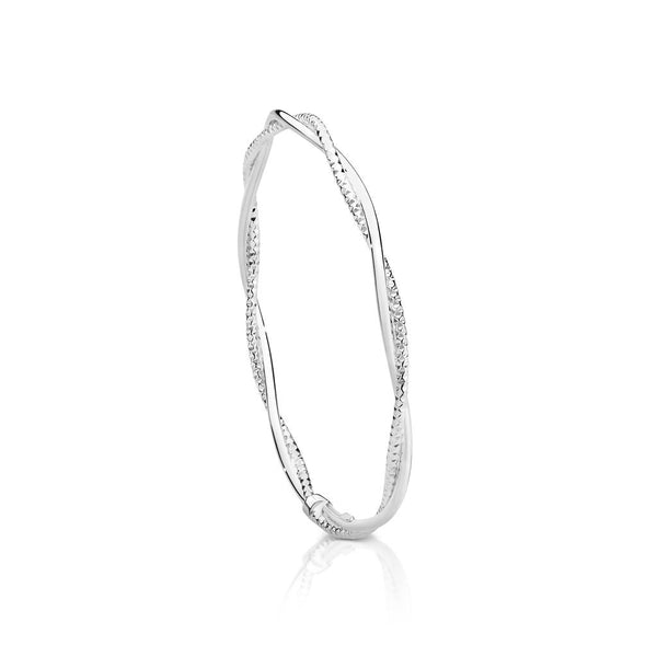 Silver polished and diamond cut twist bangle