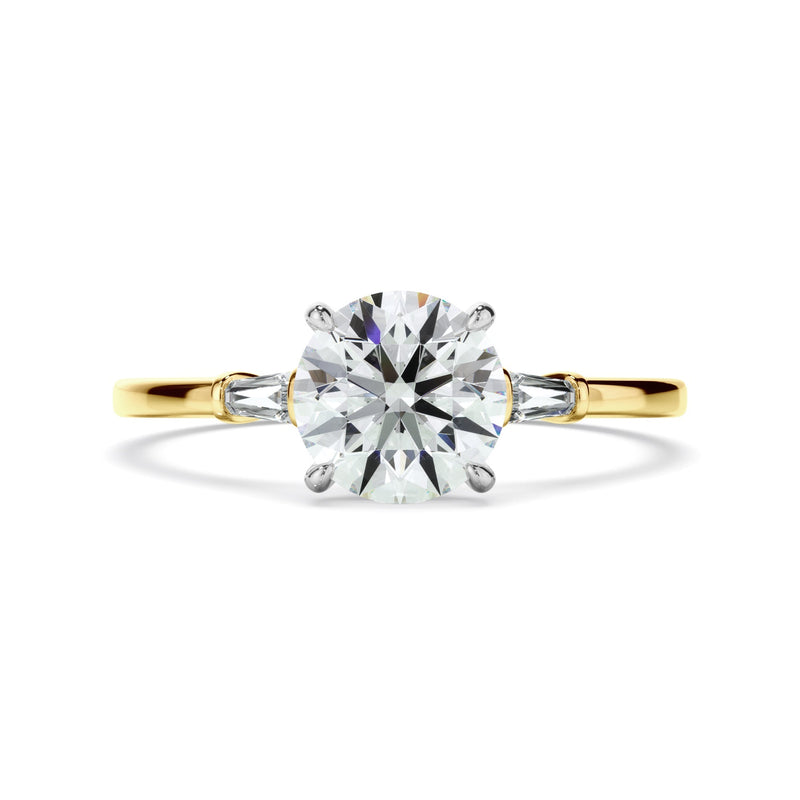 Round Brilliant Cut Diamond Engagement Ring With Baguette Sides