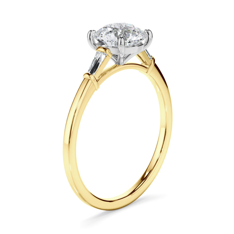 Round Brilliant Cut Diamond Engagement Ring With Baguette Sides