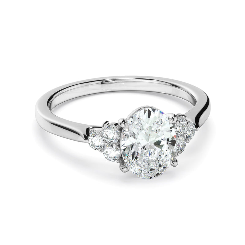 Oval Cut Diamond Engagement Ring With Diamond Cluster Sides