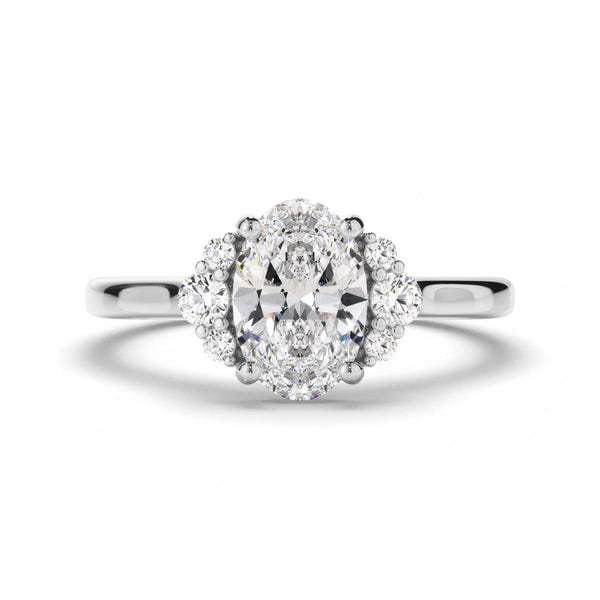 Oval Cut Diamond Engagement Ring with Diamond Cluster Sides