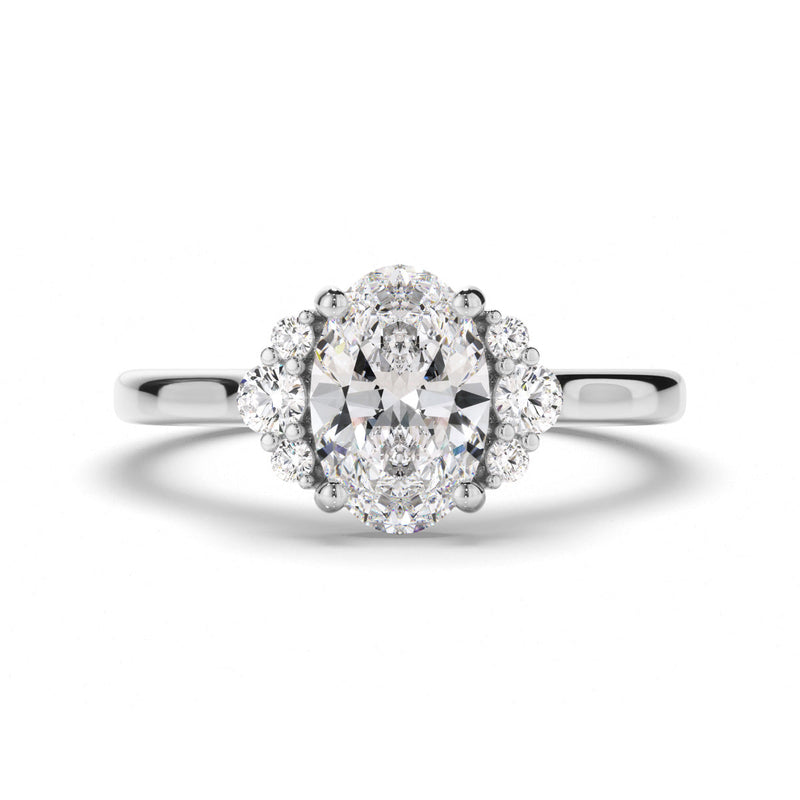 Oval Cut Diamond Engagement Ring with Diamond Cluster Sides