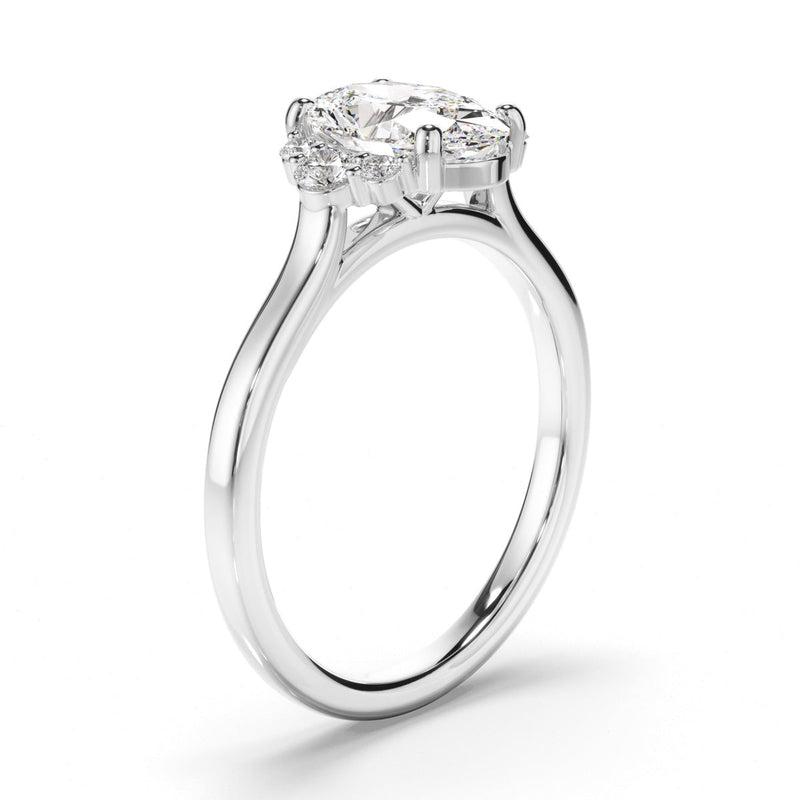 Oval Cut Diamond Engagement Ring with Diamond Cluster Sides