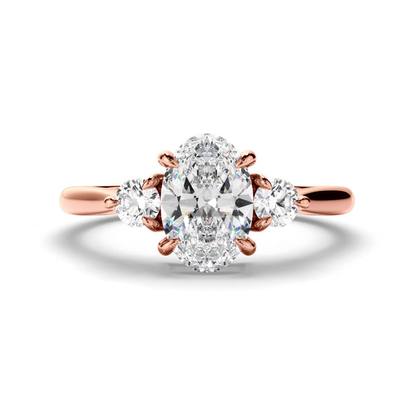 Oval Cut Diamond Trilogy Engagement Ring with Round Brilliant Sides