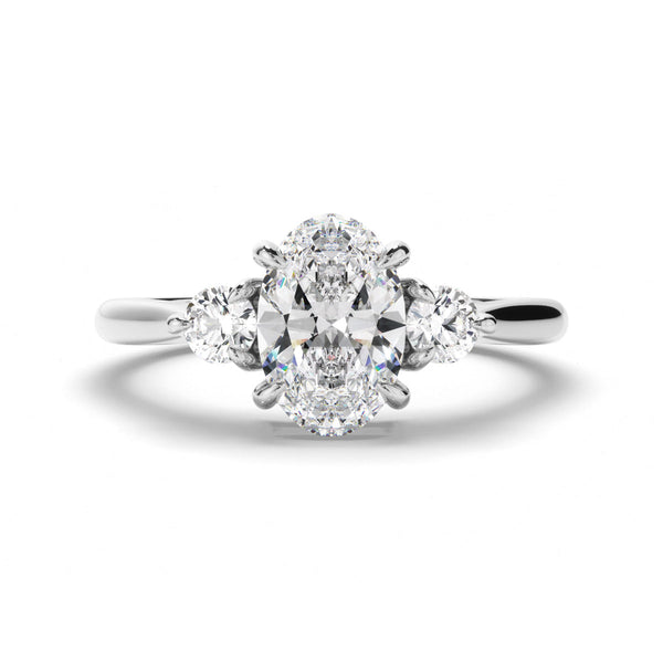 Oval Cut Diamond Trilogy Engagement Ring with Round Brilliant Sides