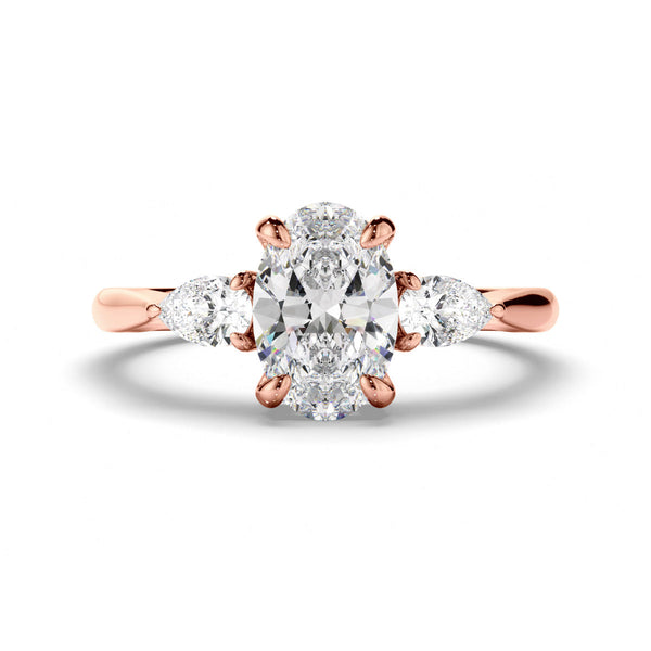 Oval Cut Diamond Trilogy Engagement Ring with Pear Sides