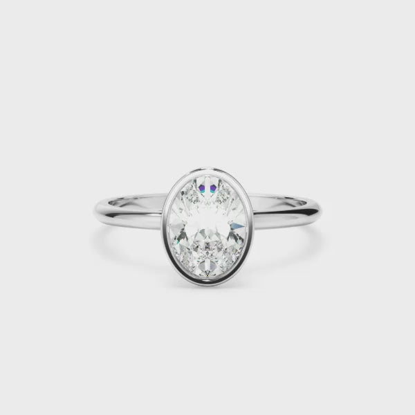 Oval Cut Diamond Solitaire Bezel Set Engagement Ring