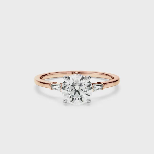 Round Brilliant Cut Diamond Engagement Ring With Baguette Sides