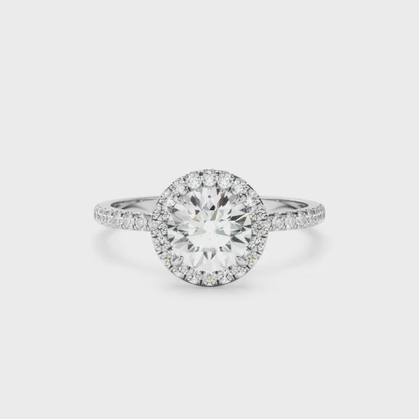 Round Brilliant Cut Diamond Halo Engagement Ring With Pave Band