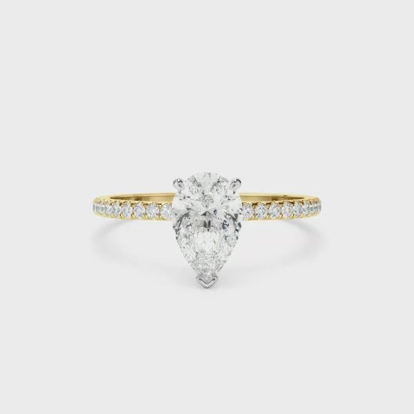 Pear Cut Diamond Solitaire Engagement Ring With Pave Band