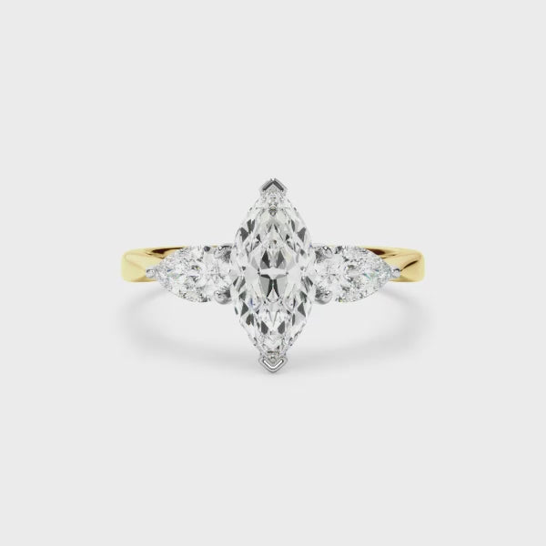 Marquise Cut Diamond Engagement Ring With Pear Cut Diamond Sides