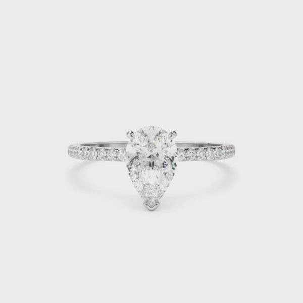 Pear Cut Diamond Solitaire Engagement Ring With Pave Band