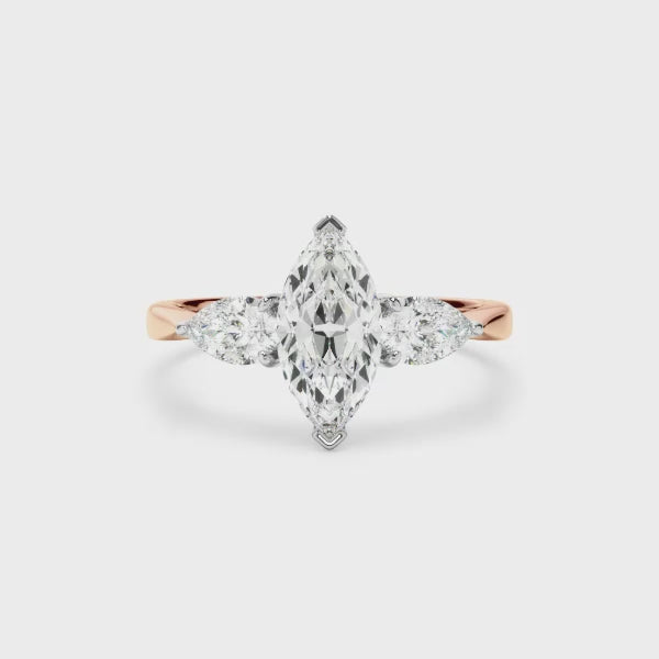 Marquise Cut Diamond Engagement Ring With Pear Cut Diamond Sides