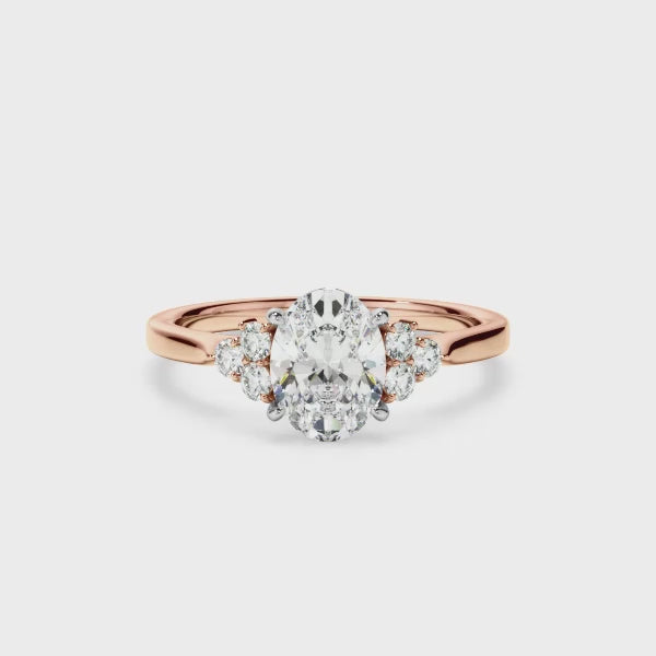 Oval Cut Diamond Engagement Ring With Diamond Cluster Sides