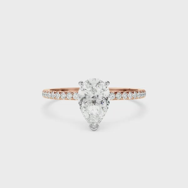 Pear Cut Diamond Solitaire Engagement Ring With Pave Band